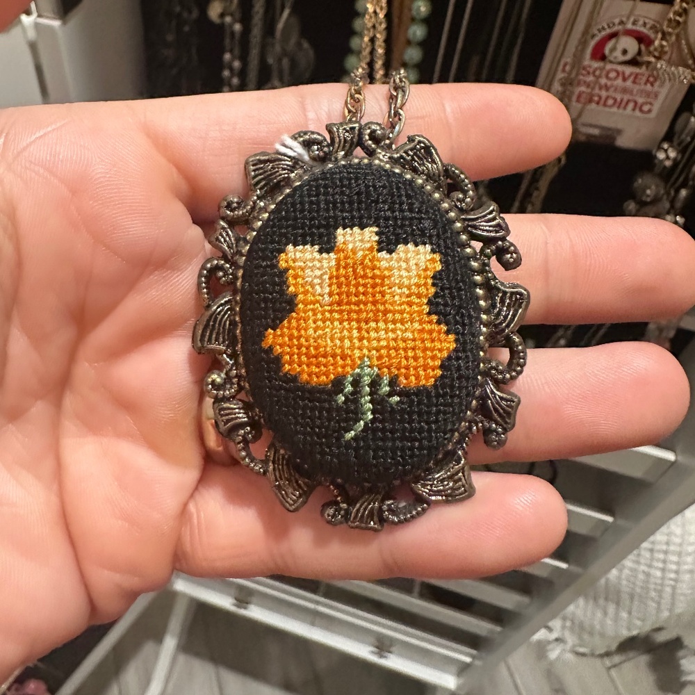 Vintage hand sewn necklace with pin on back